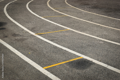 black tarmac asphalt of running track  athletic sport background