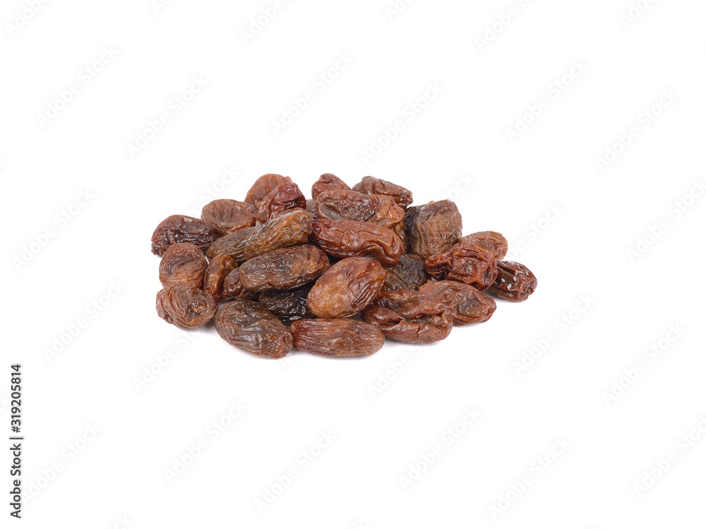 pile of dried black raisins on white background pile of dried black raisins on white background