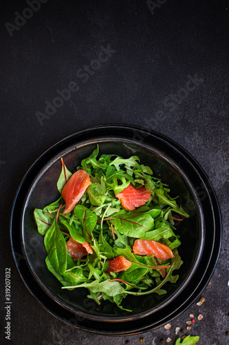 healthy salad leaves mix, salmon or tuna (delicious snack) menu concept. food background. top view. copy space