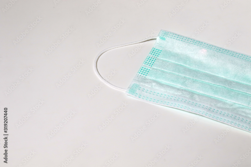 Green isolated mask on white background for corona virus concept Green isolated mask on white background for corona virus concept