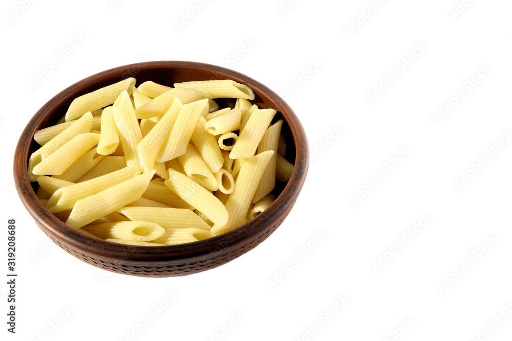 Pasta. Penne in a clay plate isolated. Pasta. Penne in a clay plate isolated.