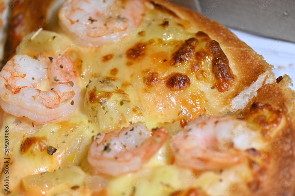 italian pizza cheese with pineapple and shrimp topping sea food