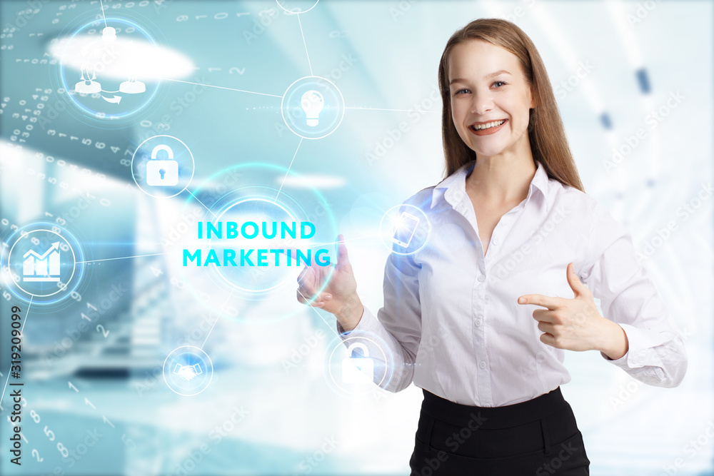 Business, Technology, Internet and network concept. Young businessman working on a virtual screen of the future and sees the inscription: Inbound marketing Business, Technology, Internet and network concept. Young businessman working on a virtual screen of the future and sees the inscription: Inbound marketing