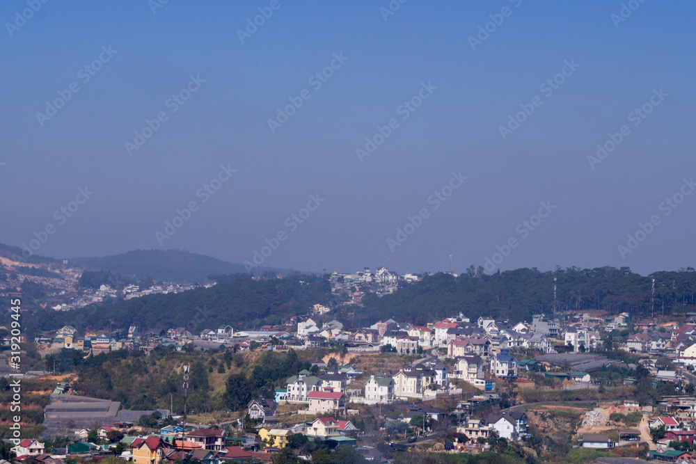 panorama of the city against the sky . aerial photography