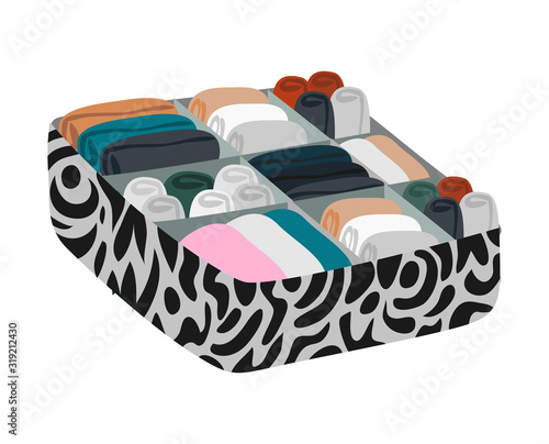 Box with dividers with folded underwear for organizing order and storage in the closet isolated on white background. Vector illustration