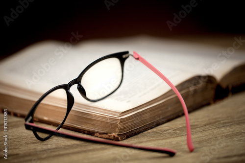 Close up glassess on old books