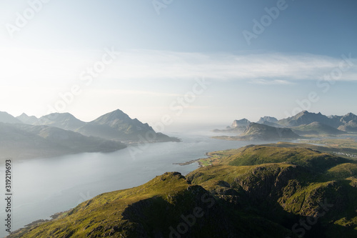 Lofoten islands are full of mountains and ocean view. From Skottinden mountain to Unstad village and hikes all around photo