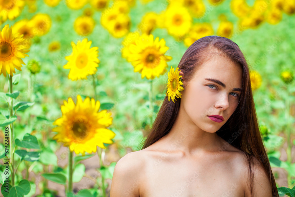 Photo of pretty brunette woman in sunflowers field Photo of pretty brunette woman in sunflowers field
