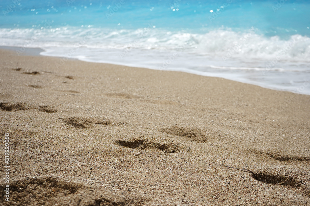 footprints on the pebble beach of the Mediterranean Sea of Greece, Lefkada, Porto Katsiki footprints on the pebble beach of the Mediterranean Sea of Greece, Lefkada, Porto Katsiki