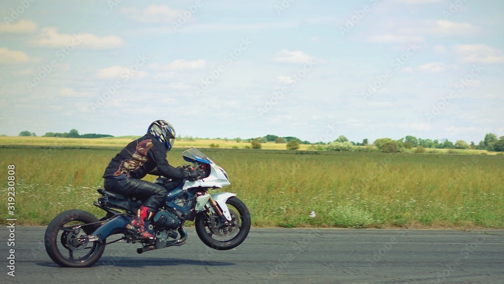 motorcycle on the road - obrazy, fototapety, plakaty 