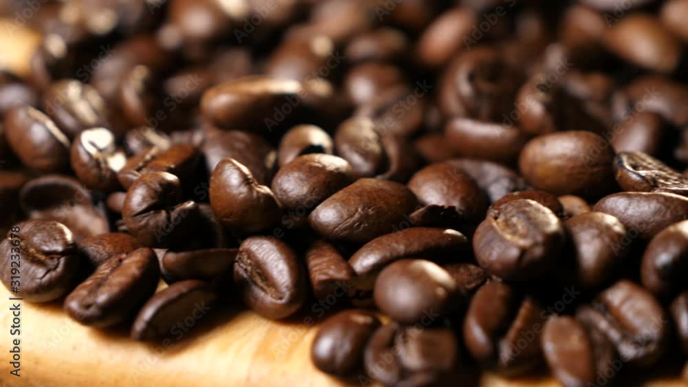 Panorama from left to right. Coffee on a wooden board. Coffee beans. Coffee. Drink. Close-up. Panorama from left to right. Coffee on a wooden board. Coffee beans. Coffee. Drink. Close-up.