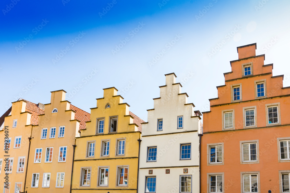 colorful stepped gable houses on market square in Osnabruck,  Germany