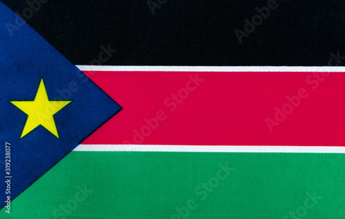 Flag of the Republic of South Sudan on a textile basis close-up