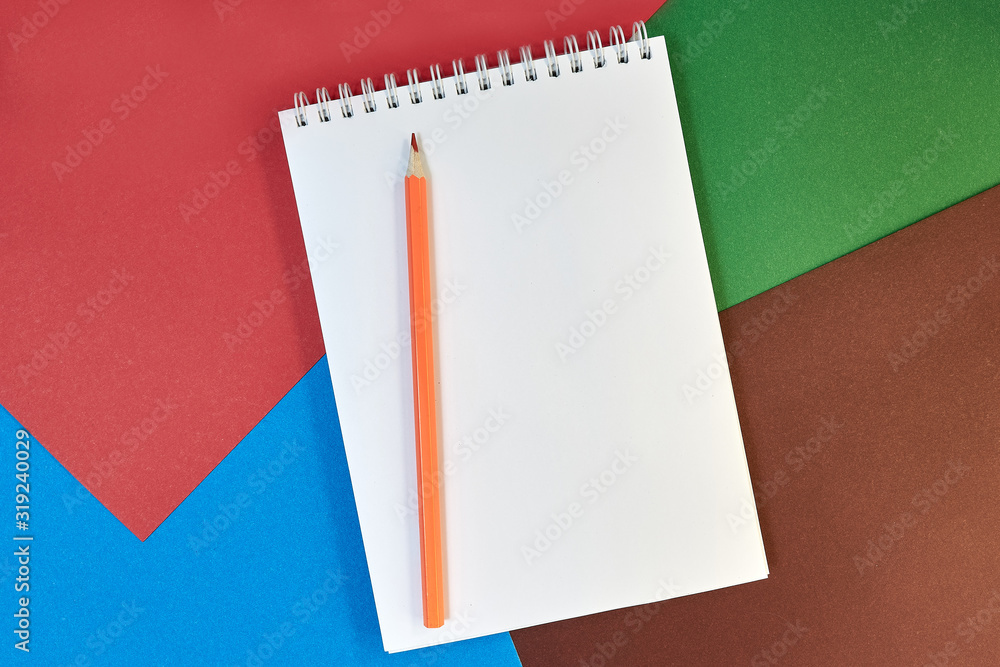 School supplies, open notebook, pencils, paper on color cardboard background with place for text. Back to school. Education and school concept. flat lay. copy space School supplies, open notebook, pencils, paper on color cardboard background with place for text. Back to school. Education and school concept. flat lay. copy space