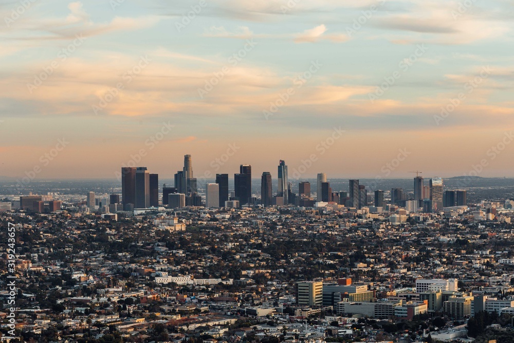 The view from Griffith Observatory on Los Angeles downtown during the sunset.. The view from Griffith Observatory on Los Angeles downtown during the sunset..