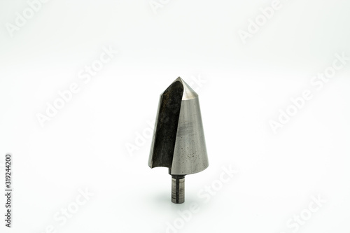 A countersink cutter standing on a white background