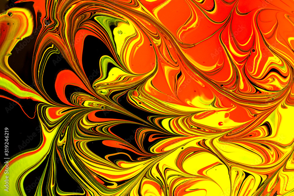 Close up of black, red and yellow paint swirls to make and abstract background Close up of black, red and yellow paint swirls to make and abstract background