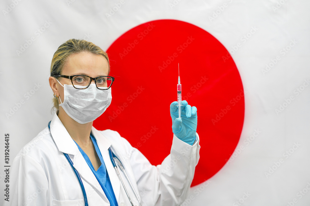 Female doctor or nurse in blue gloves holding syringe for vaccination and looking at the camera against the background of the Japan flag. Medicine concept and fight the virus. Coronavirus in Japan. Female doctor or nurse in blue gloves holding syringe for vaccination and looking at the camera against the background of the Japan flag. Medicine concept and fight the virus. Coronavirus in Japan.