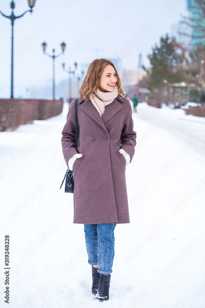 Portrait of a young beautiful woman in a winter coat Portrait of a young beautiful woman in a winter coat