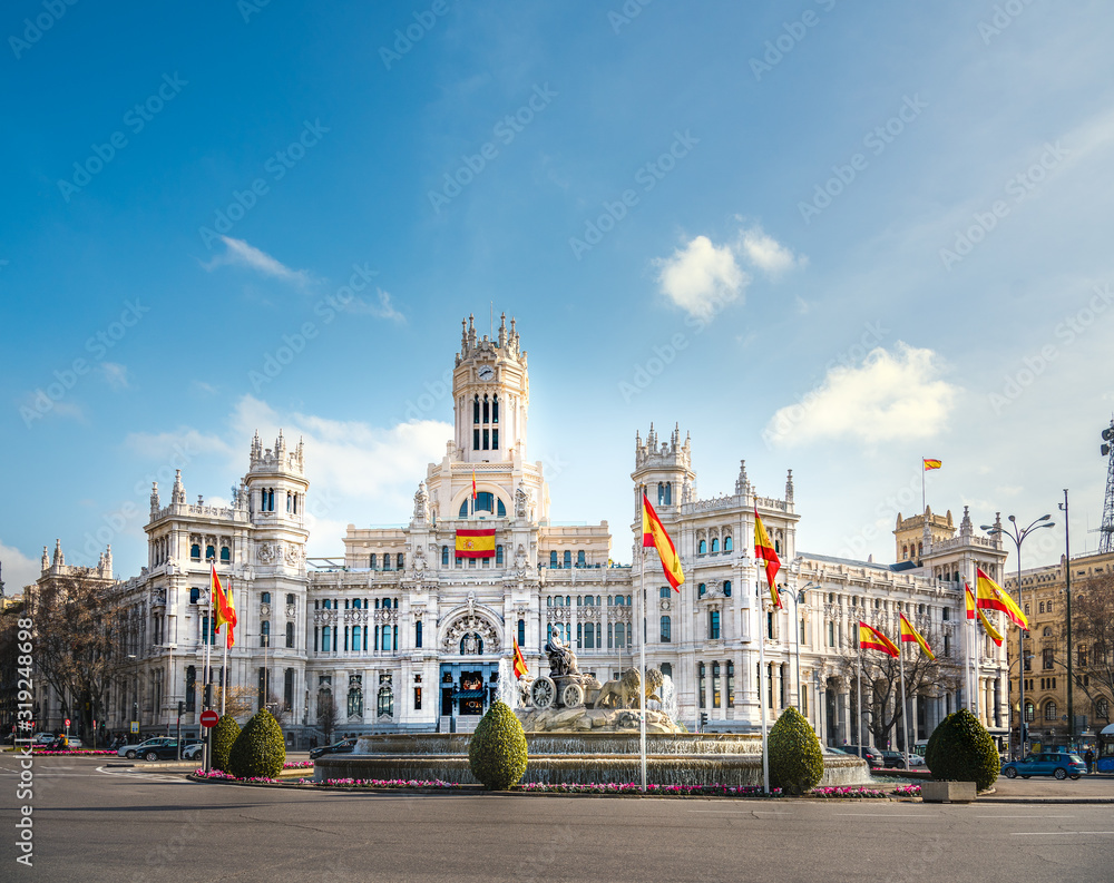 Madrid city hall under a blue sky with clouds