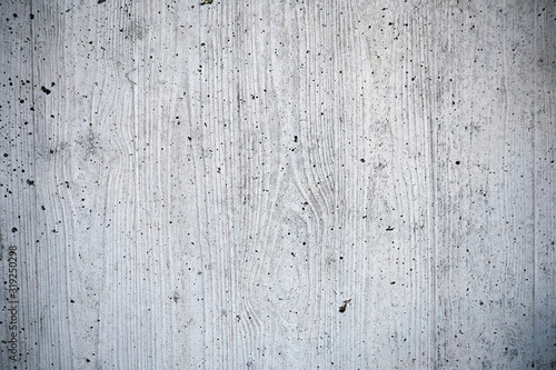 Grey concrete wall with clear detailed wood stamp texture background made of wooden formwork