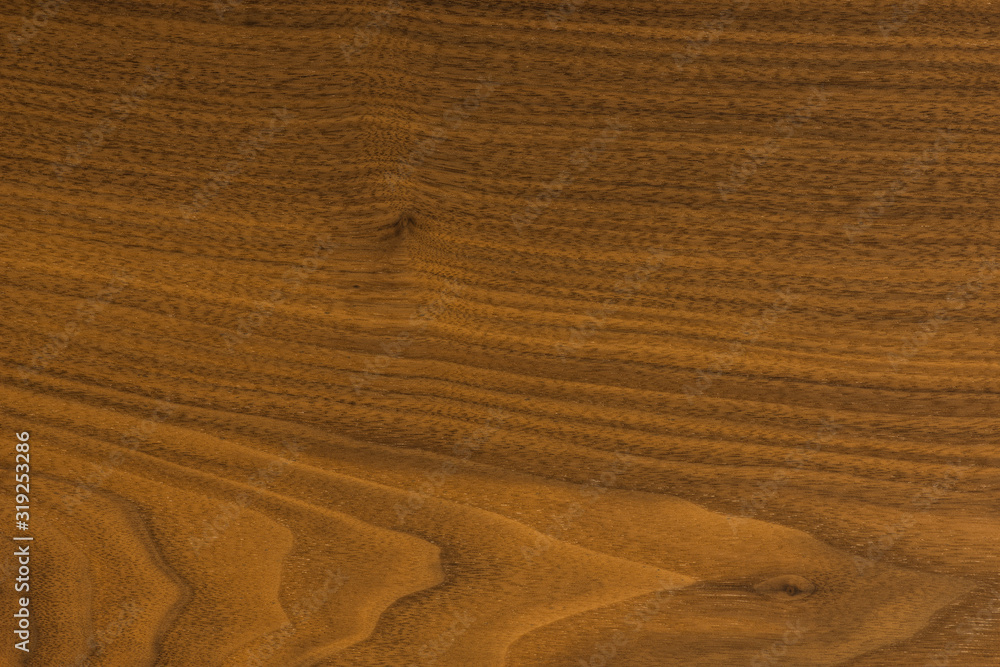 background of Walnut wood surface background of Walnut wood surface