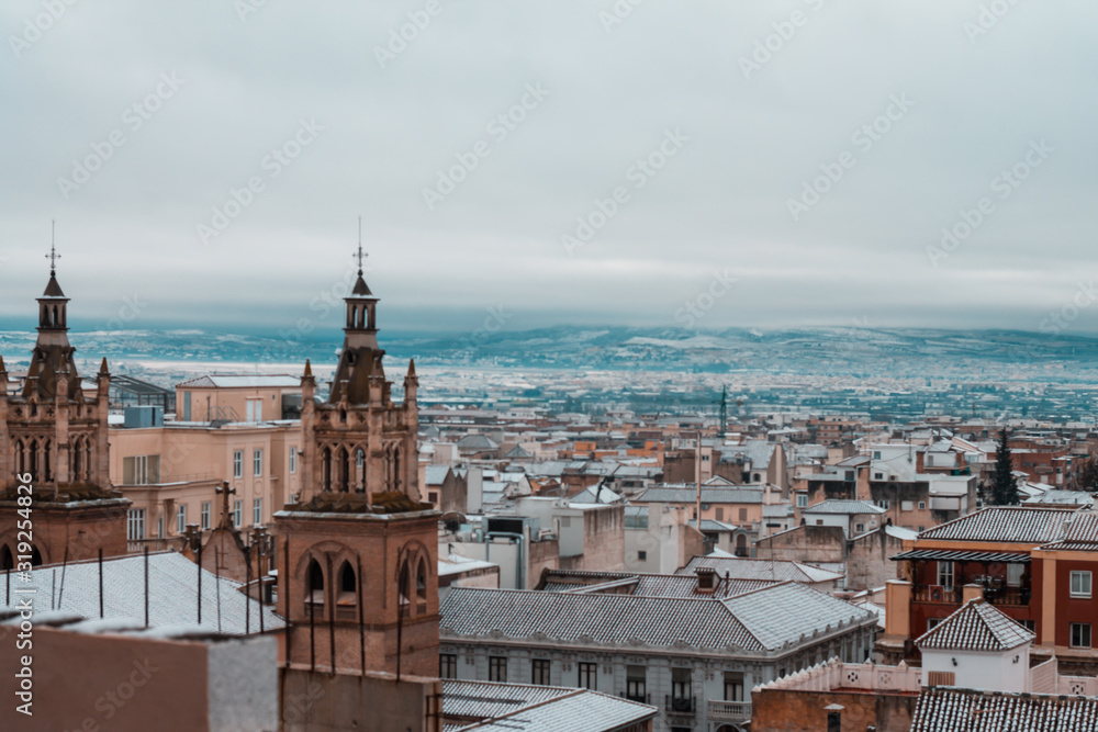 City of Granada after a big snowfall with the cathedral in the background