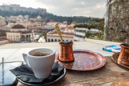Greek coffee served on the table in traditional cafe in Athens, Greece