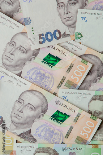 bitcoin against the background of the ukrainian hryvnia photo