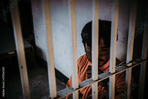 Prisoner in the iron prison,prisoner concept,thailand people,Hope to be free. © reewungjunerr