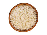 Rice grains in wooden Cup on white background