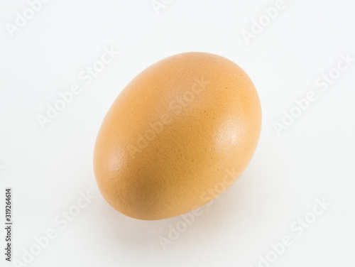 Chicken brown egg on a white isolated background. The best quality.