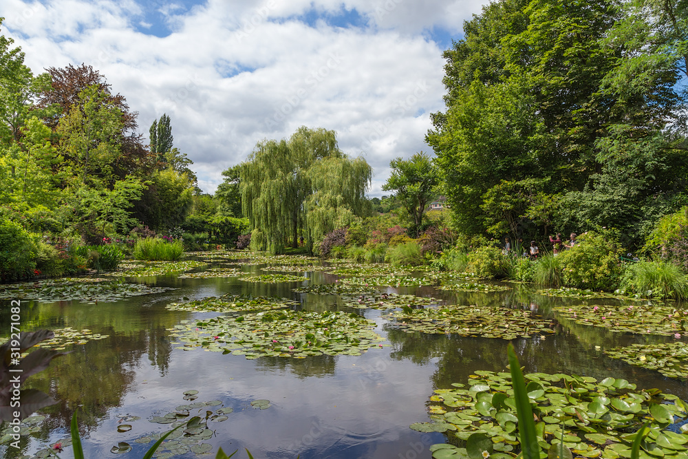 Giverny, France. Picturesque pond with water lilies in the garden of impressionist painter Claude Monet