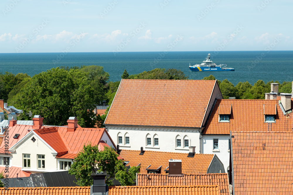 Houses in Visby, Gotland, Sweden with Coast Guard Boat