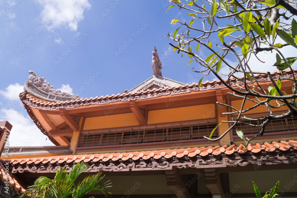 sunlit roof of an asian temple sunlit roof of an asian temple