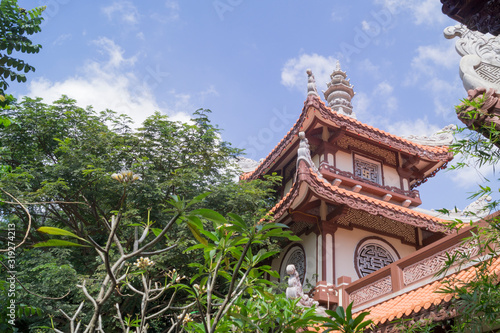  roof of an asian temple against the sky