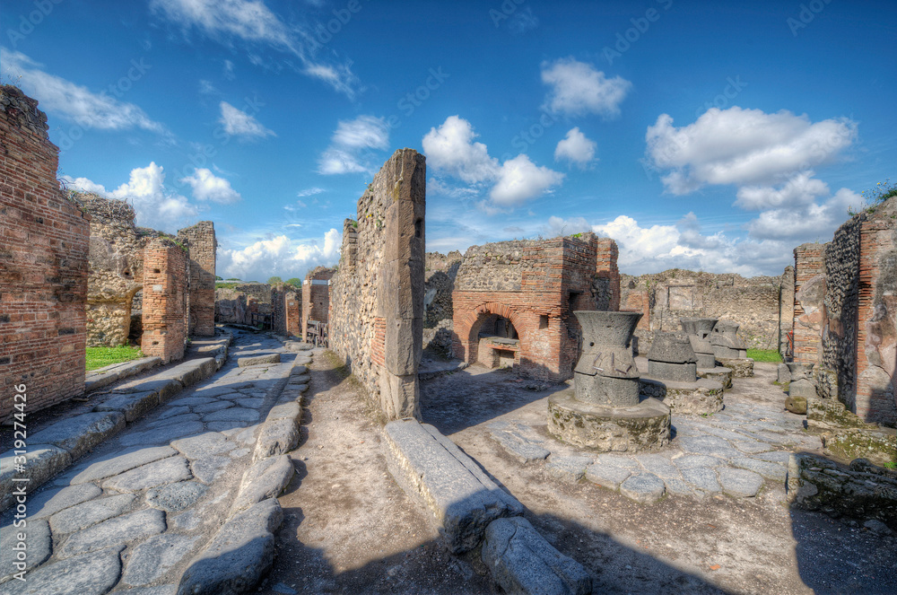 Pompeii excavations - ancient oven with mills