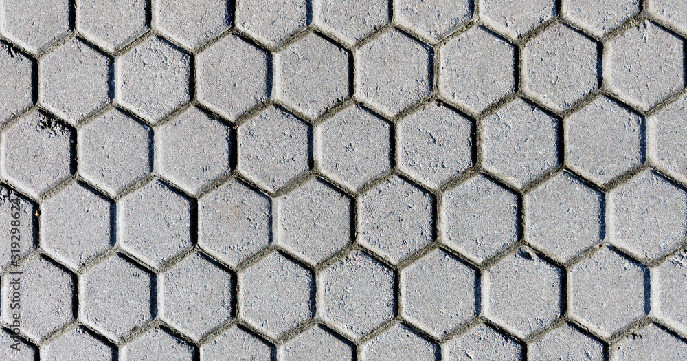 The black and white background image of hexagonal clay tiles The black and white background image of hexagonal clay tiles