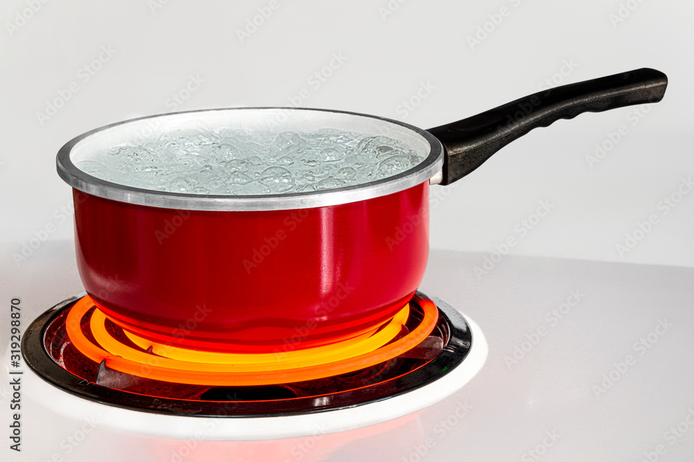 Steam Swirling Up From Pot Of Boiling Water On Red Hot Electric Stove Burner  Stock Photo - Download Image Now - iStock