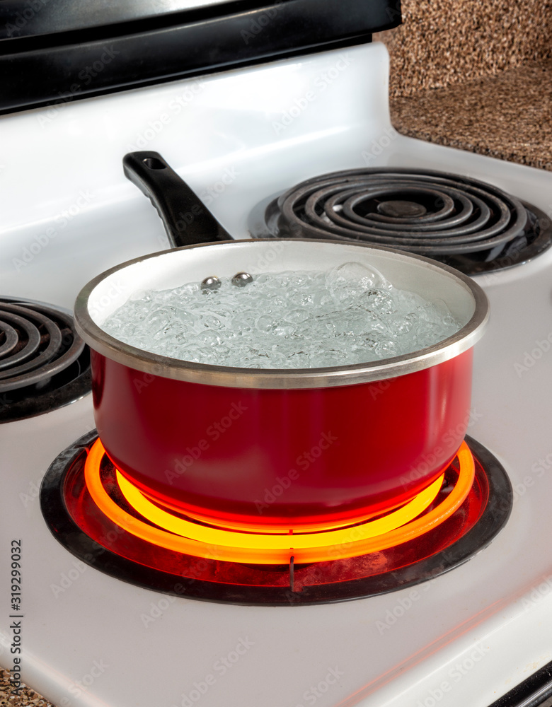 Steam Swirling Up From Pot Of Boiling Water On Red Hot Electric Stove Burner  Stock Photo - Download Image Now - iStock