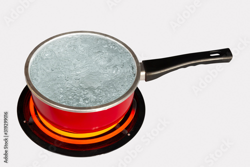 Red Pot of Boiling Water On White