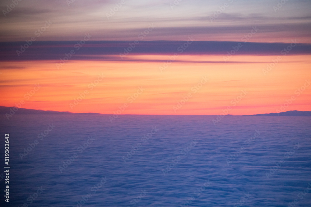 amazing sunrise over the clouds
