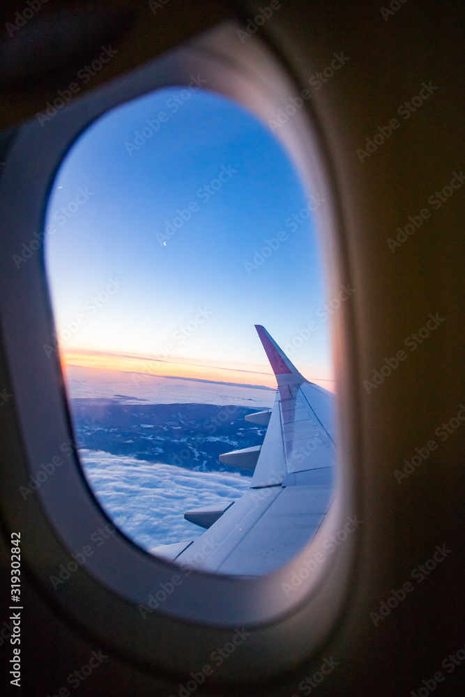 plane flying over amazing sunrise over the clouds plane flying over amazing sunrise over the clouds