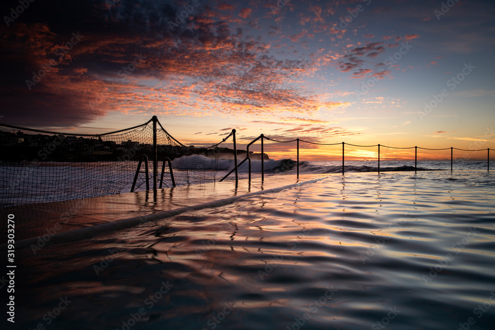 Swimming pool at sunrise, Bronte Beach, Sydney Australia