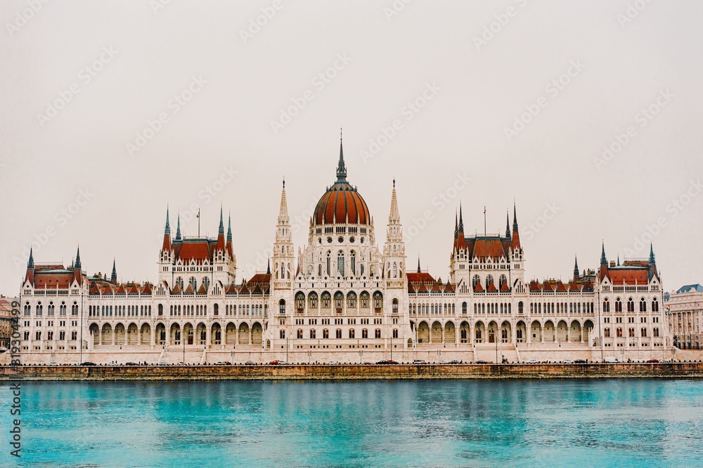 Fototapeta premium View to Hungarian Parliament Danube River. Beautiful scene of ancient gothic architecture.