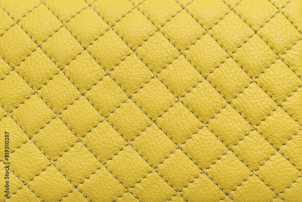 Fototapeta premium Detail of green sewn leather. Green leather upholstery background texture