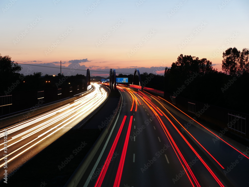 Long exposure image of the German Autobahn A8 near Augsburg during sunset