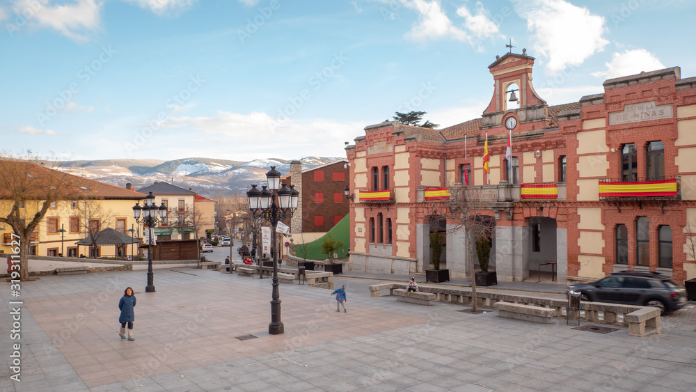 Beautiful snowy landscape of Guadarrama mountains in a small medieval town of Rascafria near the Spanish capital Madrid in winter. Famous touristic attraction for winter sports in Madrid, Spain