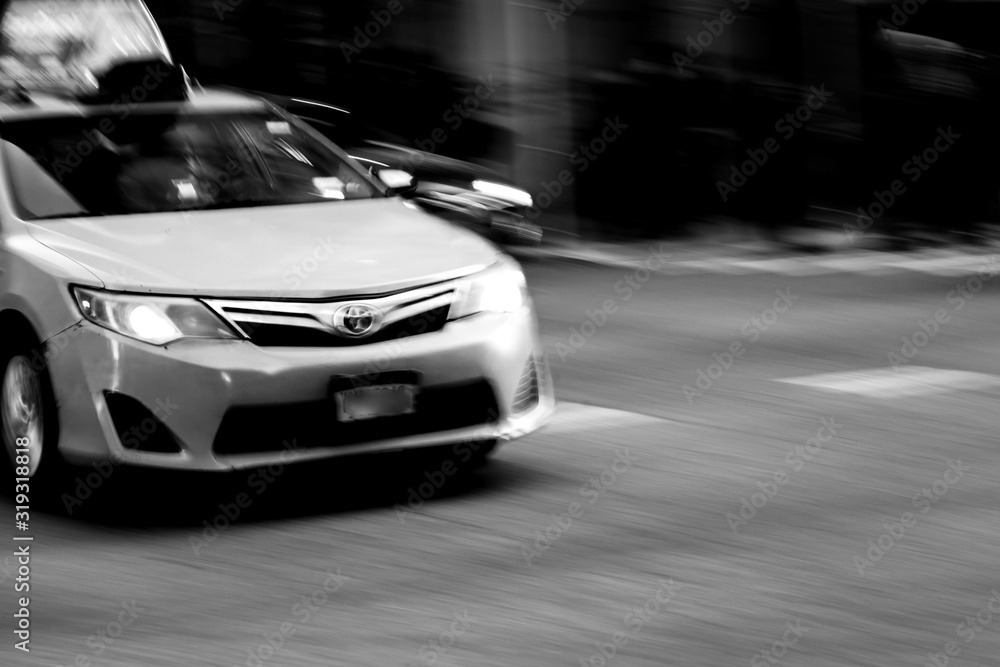 Black and White Taxi Runner Motion Blur