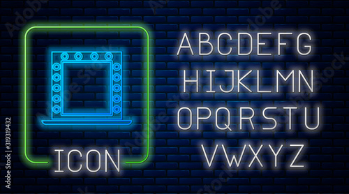 Glowing neon Makeup mirror with lights icon isolated on brick wall background. Neon light alphabet. Vector Illustration